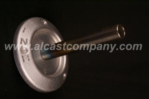 Aluminum gear selector casting with cast-in insert for handle